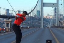 Relive the moment Tiger Woods hit a golf ball from Asia into Europe (Video)